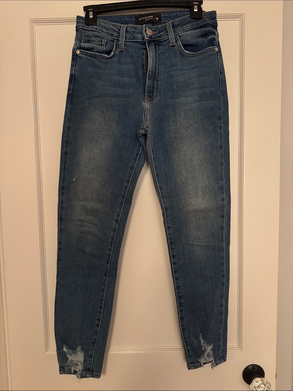 Just Black women’s Skinny Jeans in Distressed Blue Wash